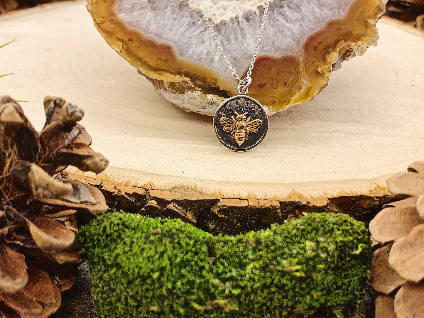 Moon Phases Over a Golden Bee