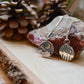 Mountain night time scene necklaces