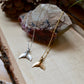 Whale tale necklace