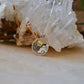 Clouds with sun necklace