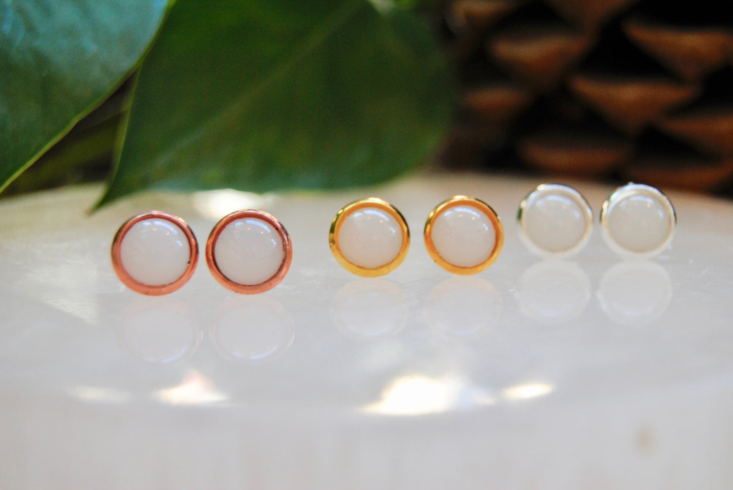 White resin stud earrings