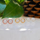White resin stud earrings